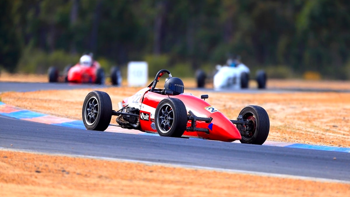 Red Formula Vee race car on track in Western Australia